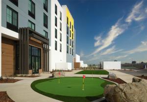 a golf course in front of a building at Hilton Garden Inn Merced in Merced