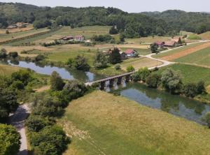 an aerial view of a bridge over a river at Apartment Freya in Zadoborje +3 photos
