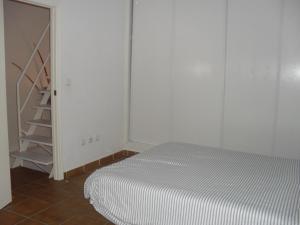 A bed or beds in a room at Alcaraván 32