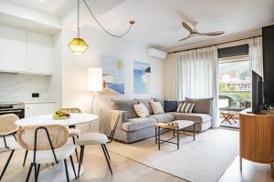 a living room with a couch and a table at Dimitris Residence in Tivat