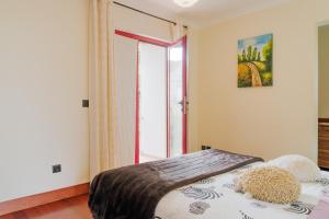 Uma cama ou camas num quarto em Casa Ci