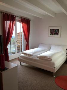 Postel nebo postele na pokoji v ubytování B&B Pension Marina
