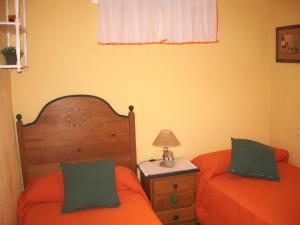 a bedroom with two beds and a table with a lamp at Apartment Martinez Casablanca in Alcossebre +48 photos
