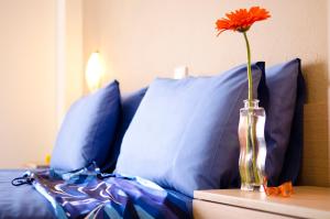 Ένα ή περισσότερα κρεβάτια σε δωμάτιο στο Stratos Hotel 