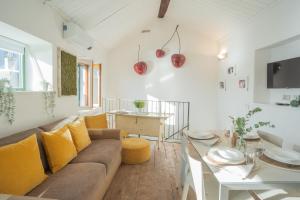 a living room with a couch and a table at La Casa di Pietro in Blevio