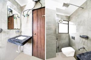 a bathroom with a sink and a toilet at Super Hotel O Tagore Park Laskarhat Formerly Shankar Guest House in Kolkata