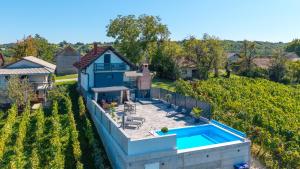 an aerial view of a house with a swimming pool at Villa Vinea by Villas Guide in Novakovec