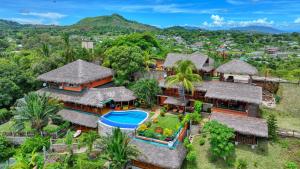 an aerial view of a villa with a swimming pool at VILLA PANORAMA NOSY BE in Nosy Be
