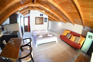 a living room with a couch and a table at Studio Gio in Zakynthos City in Zakynthos