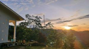 a view of a sunset from a house at Filomena Lodge in Ende +26 photos