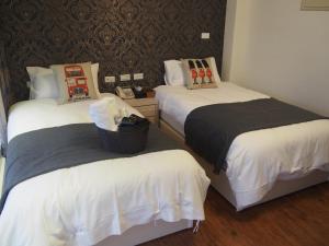 Postel nebo postele na pokoji v ubytování Successful 168 B&B