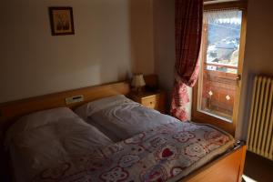 Cama o camas de una habitación en Hotel Cime Bianche