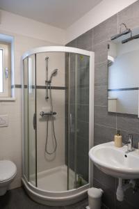 a bathroom with a shower and a sink at Villa Leo in Koper +20 photos