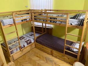 a room with two bunk beds in a room at Хостел Центр in Kharkiv +6 photos