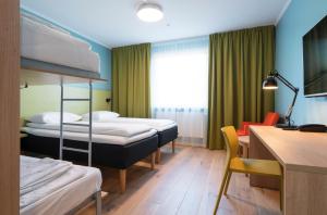 Postel nebo postele na pokoji v ubytování Thon Hotel Gardermoen + 21 fotografií