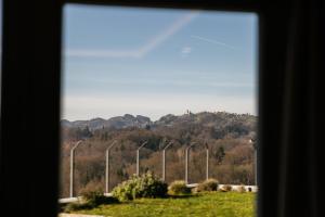 a view of a field with a row of street lights at Villa Diona in Loka pri Žusmu +18 photos