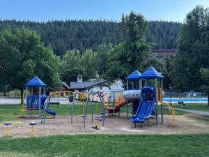 a group of playground equipment in a park at The Brick House, Kellogg ID in Kellogg