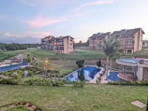 an aerial view of a resort with a swimming pool at dreams of the mountains in Bananeiras