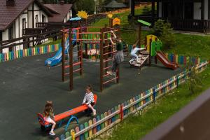 a group of children playing on a playground at Mal'ovanka in Bukovel