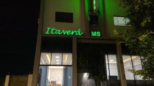 a sign on the front of a building at HotelItaveraMS in Campo Grande