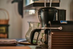 a coffee maker sitting on top of a counter at Maison Capucine in Hossegor