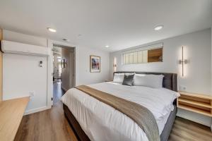 a bedroom with a large bed with white sheets at The Riv at Zion in Virgin +27 photos