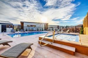 a pool on the roof of a hotel at The Riv at Zion in Virgin