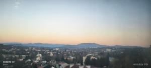 a view of a city with mountains in the background at Noclegi Gambit Cieszyn 24h in Cieszyn