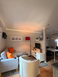 a living room with a couch and a table at "Haus Bella" in Cochem