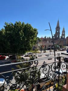 a view of a parking lot from a balcony at Apartamento 25 Centrico Chapala in Chapala