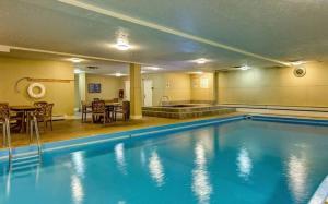 a large swimming pool in a hotel room at LongBranch #116 in Breckenridge