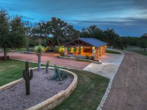 a cabin with a gazebo in a park at 7Cs Sunset Valley Ranch in Fredericksburg