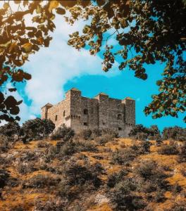an old castle on top of a hill at Apartment MILA in Senj