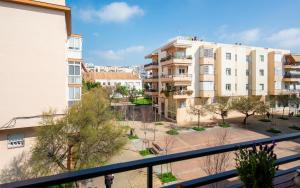 a view from the balcony of a apartment building at BONITO APARTAMENTO in Sitges