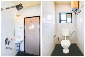a bathroom with a toilet and a sink at Collection O Belgacihia Near Kolkata Railway Station Formerly Beeu Guest House in kolkata