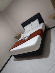 a bedroom with a bed in a room at Hotel Picasso 70 in Medellín