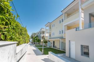 an empty street in a apartment building at Naias in Hanioti