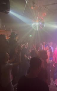 a crowd of people dancing in a club at Piccadilly Central in Manchester