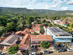an aerial view of a town with mountains in the background at Apartamento Centro de Pirenópolis Goiás in Pirenópolis