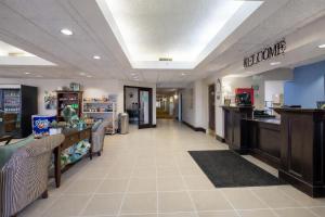a lobby of a hospital with a waiting room at Greenfield Inn & Suites Owensboro, KY Airport in Owensboro +26 photos