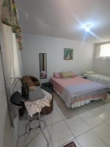 Foto de Quarto privado com Banheiro Lauany Pousada