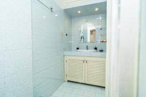 a bathroom with a sink and a mirror at Relax Between Cinque Terre and Portofino in Moneglia +51 photos