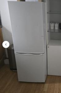 a white refrigerator with its door open in a kitchen at Self-contained Studio near Tottenham Hotspurs stadium in London