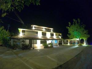a building with lights on it at night at Sea Natural in San Gil