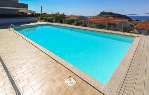 a large swimming pool on top of a building at Bilo Panorama in Castelsardo