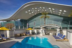 a large building with a swimming pool in front of a building at Las Vegas Marriott in Las Vegas