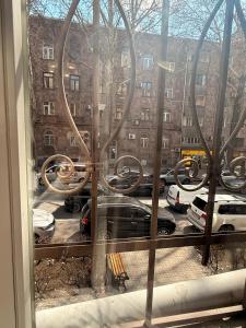 a window with a view of a parking lot at Comfortable zone in Yerevan