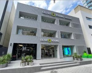 a close up of the front of a office building at 신사 여성전용 개인 미니룸 Female Only Private Mini Room Gosiwon 2pm ckeck in 11am ckeck out address 강남구 논현동6-8 BESTEL, Check the message for the check in in Seoul
