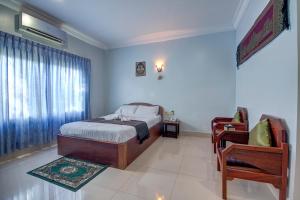 Postel nebo postele na pokoji v ubytování DV Angkor Villa + 37 fotografií