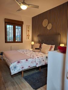 a bedroom with a bed and a ceiling at Casa Jetizo in Ontinyent +75 photos